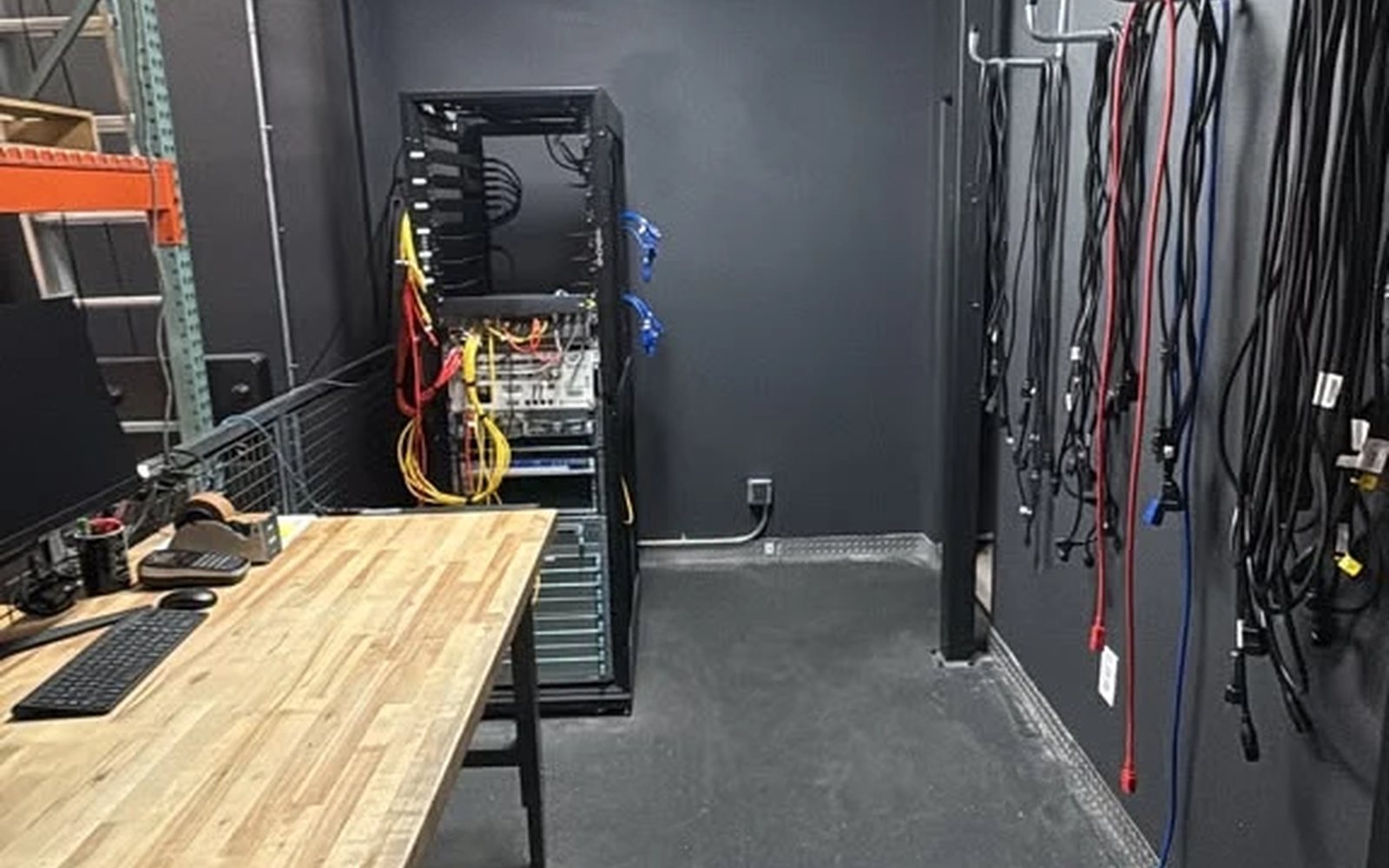 Our test bench and patch rack, where refurbished units are inspected and firmware-baselined