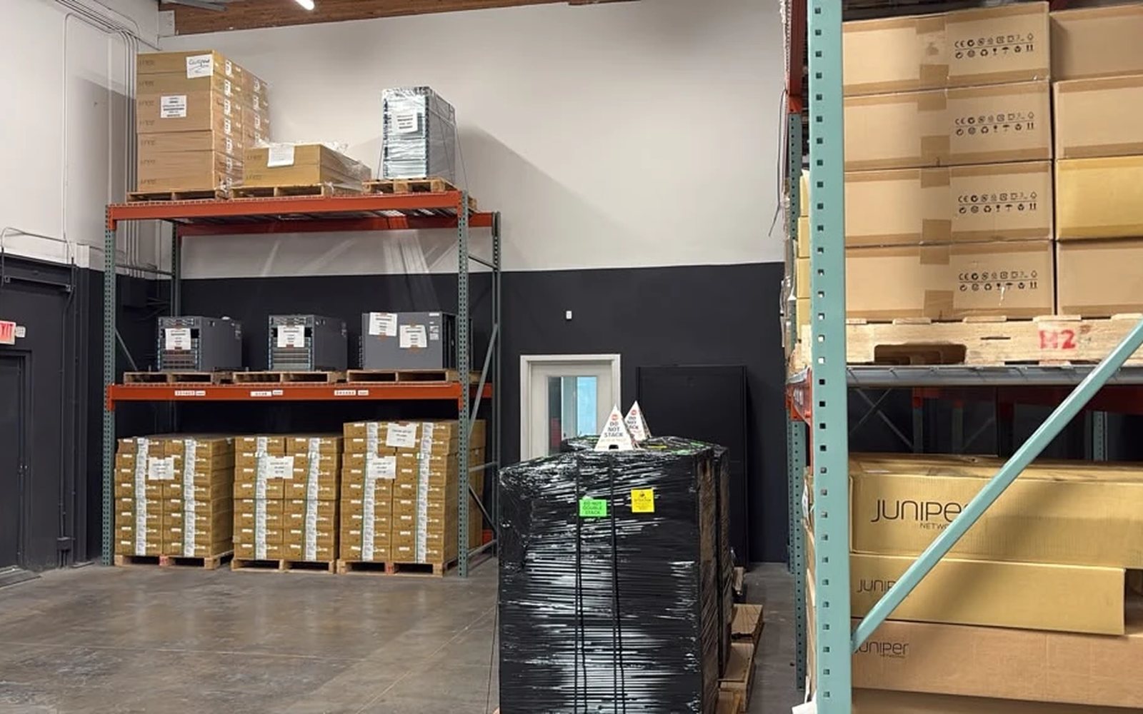 Decommissioned chassis on pallets in our Las Vegas warehouse, staged for ITAD processing
