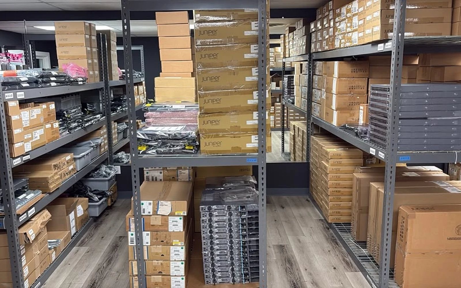 Enterprise hardware stocked on pallet racking in the Global IT Distributors warehouse